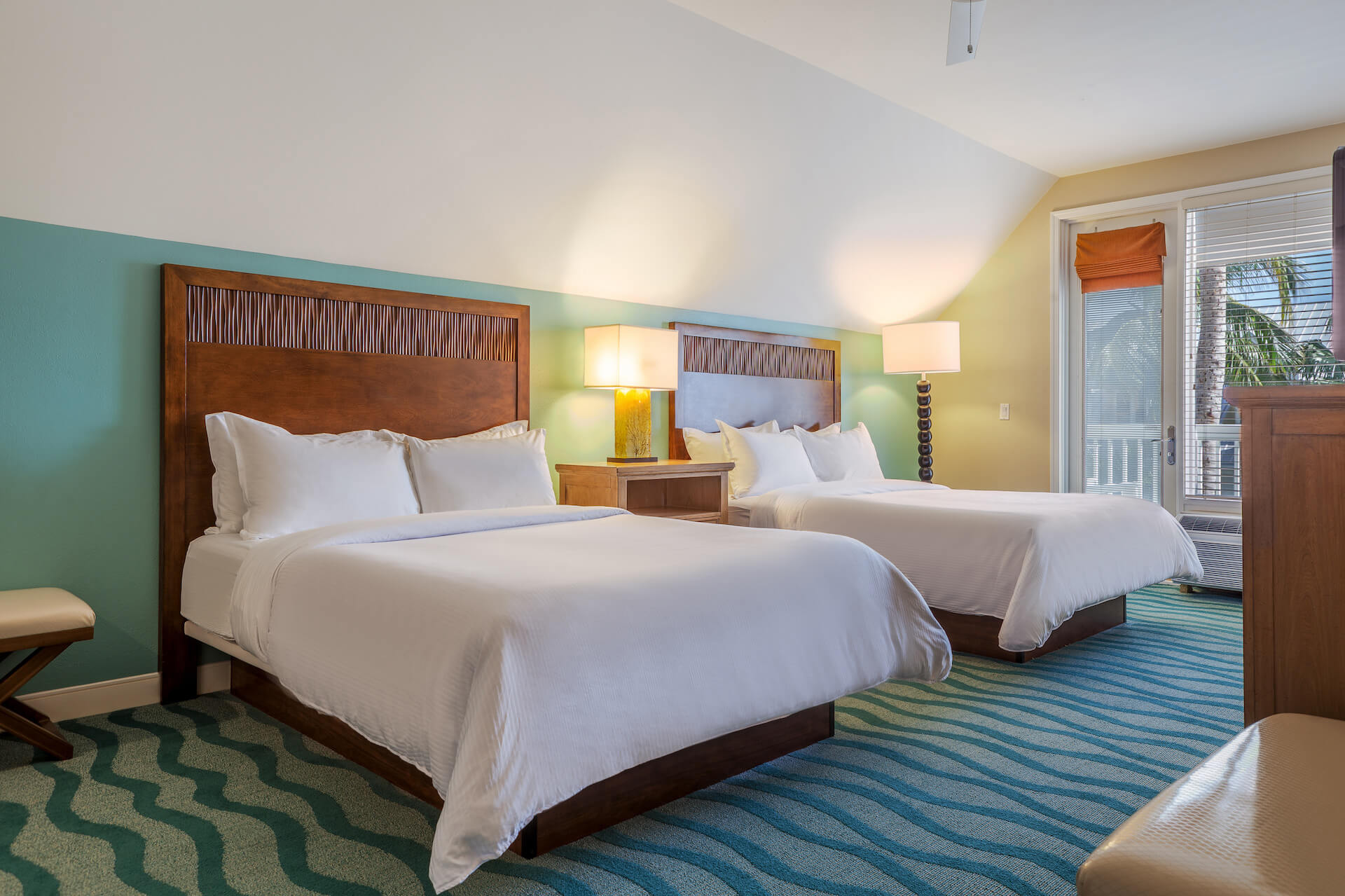 A large bed with two bedside tables